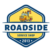 A logo for a roadside service shop with a tow truck on it.