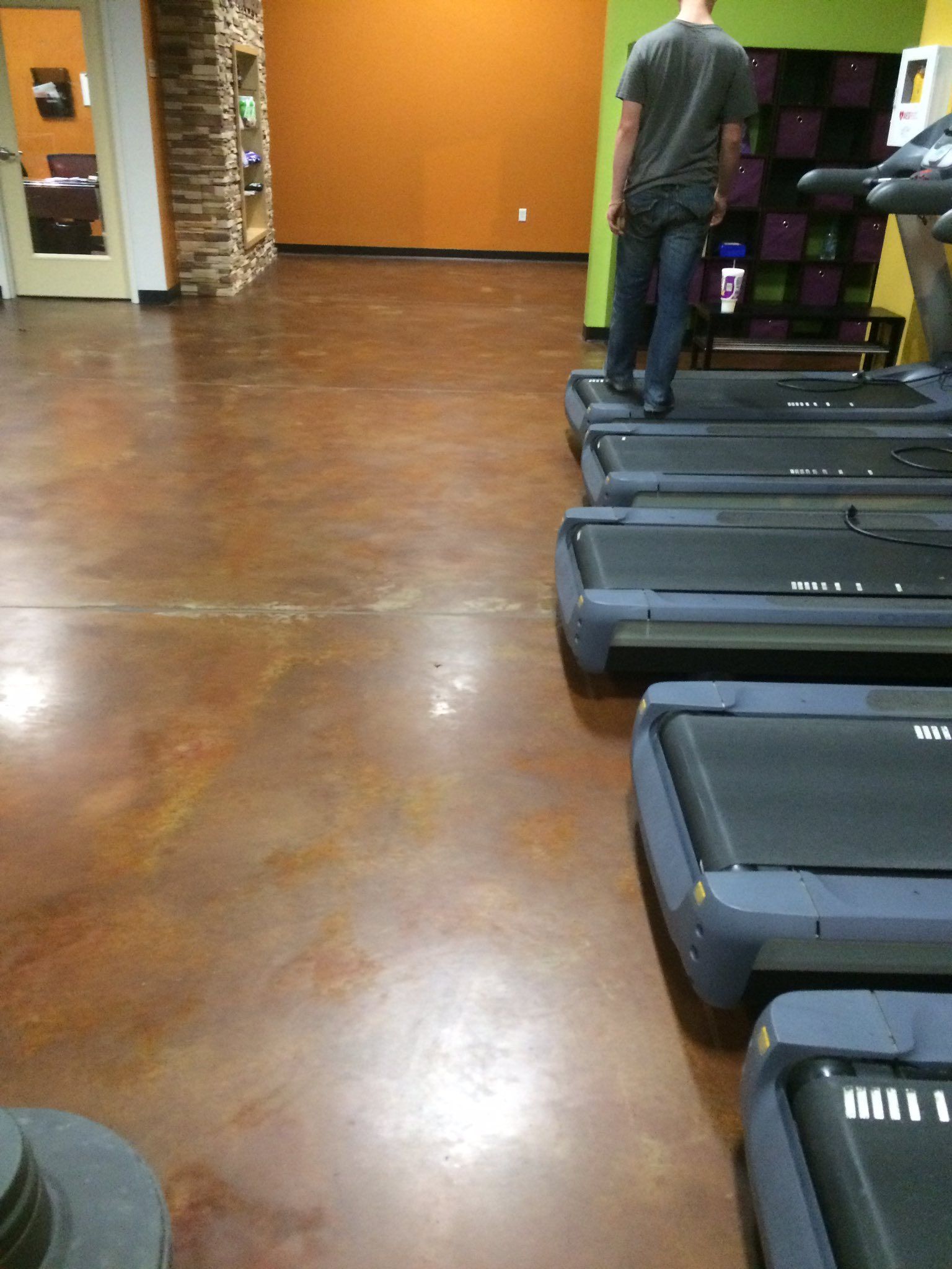 Before photo of a dirty gym floor needing professional floor polishing