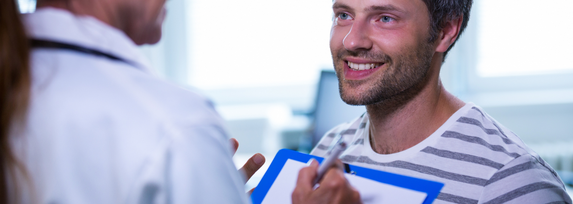 Picture of a person being gently reassured by a medical professional. Picture of a person being gently reassured by a medical professional.