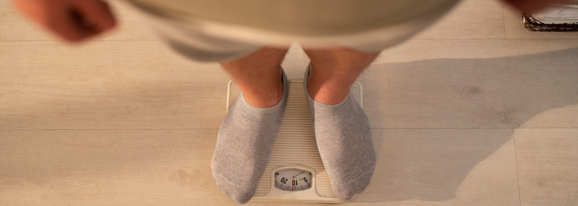 Picture of someone on scales. 