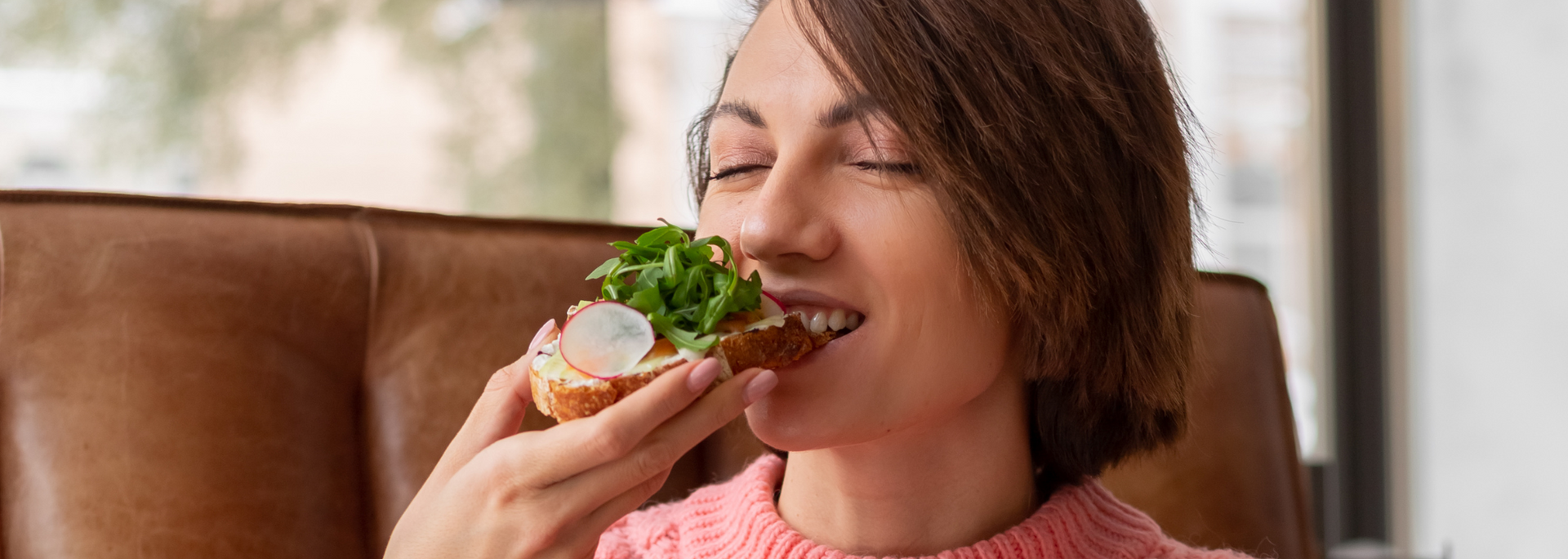 Picture of a person enjoying a healthy, tasty meal.