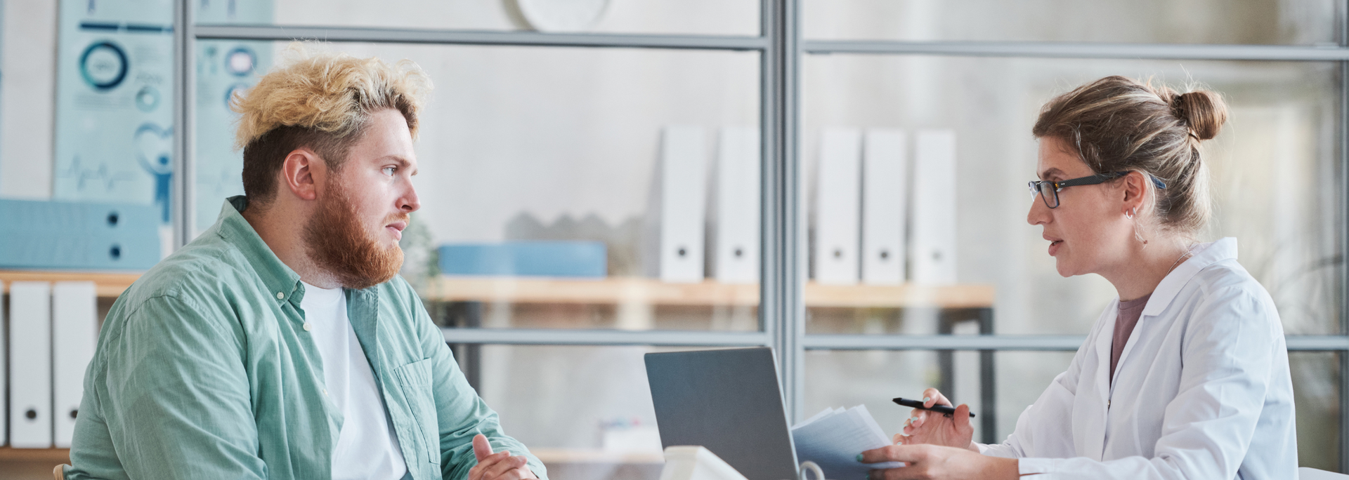 Picture of a person in consultation with a medical professional.