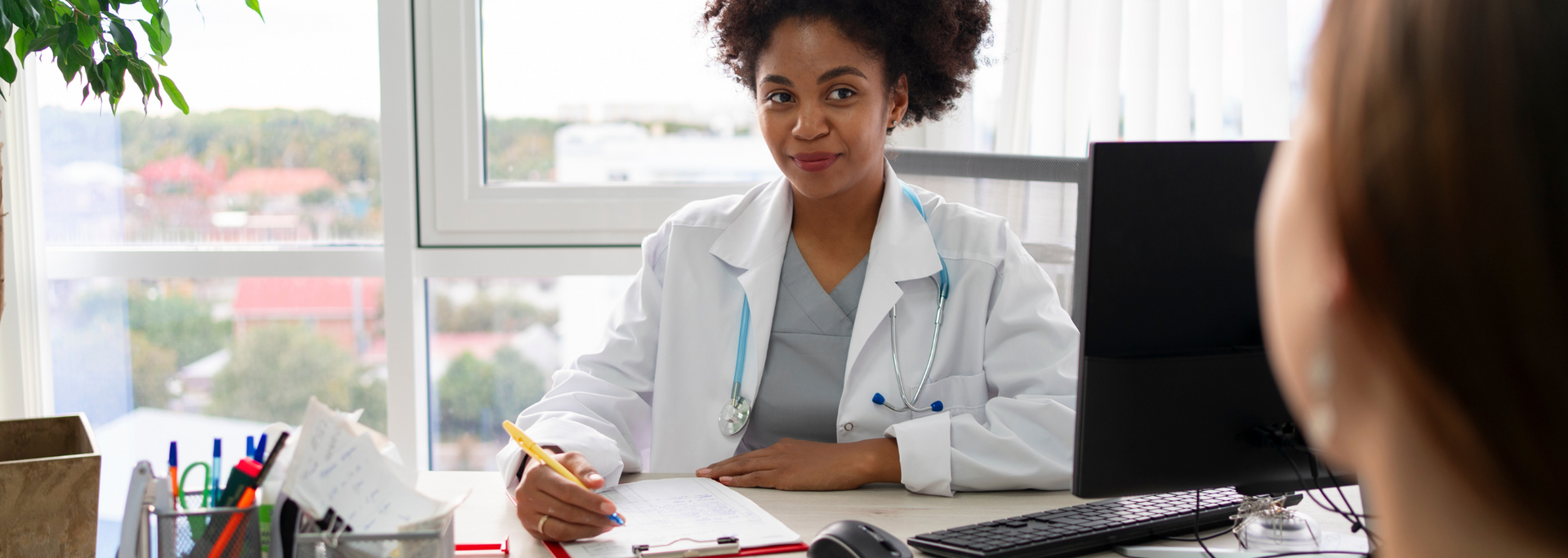 Picture of a person in consultation with a medical professional.