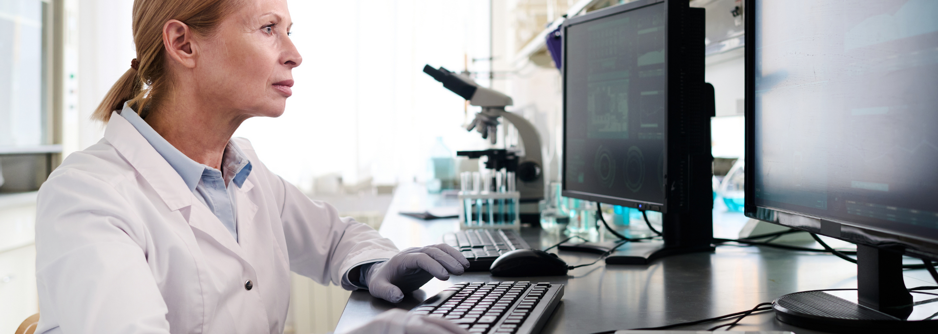 Picture of a scientist/researcher using a computer.
