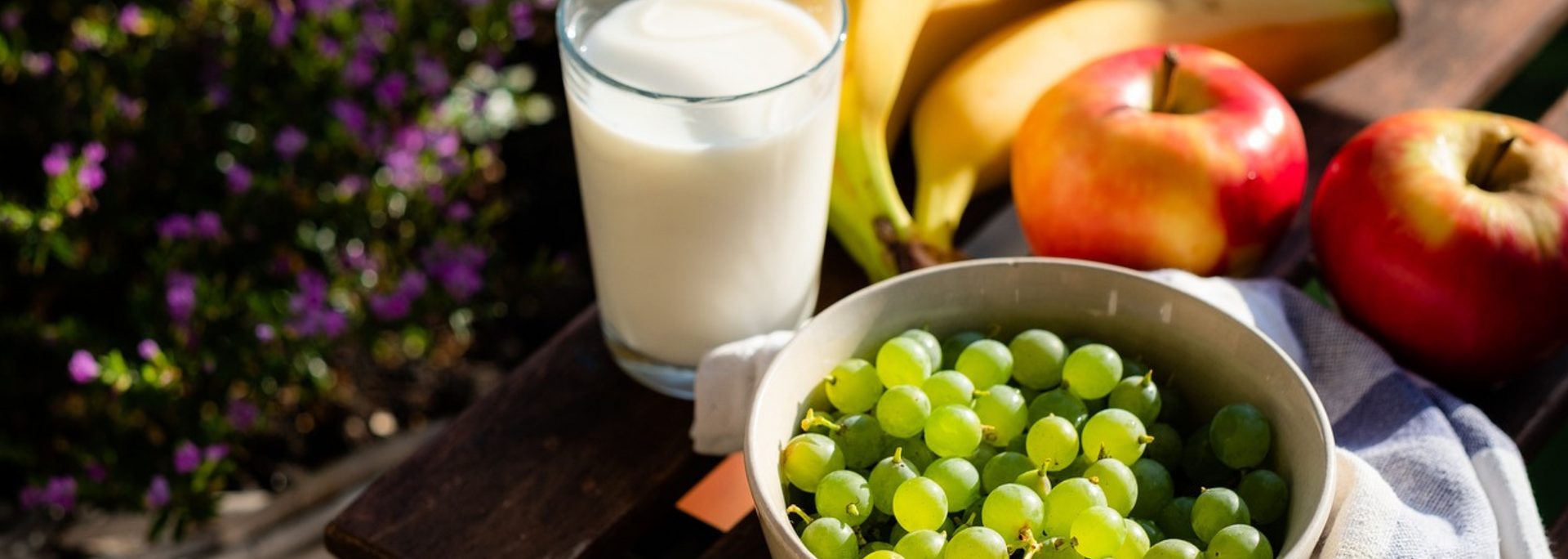 Picture of a selection of healthy foods, laid out as a balanced meal.