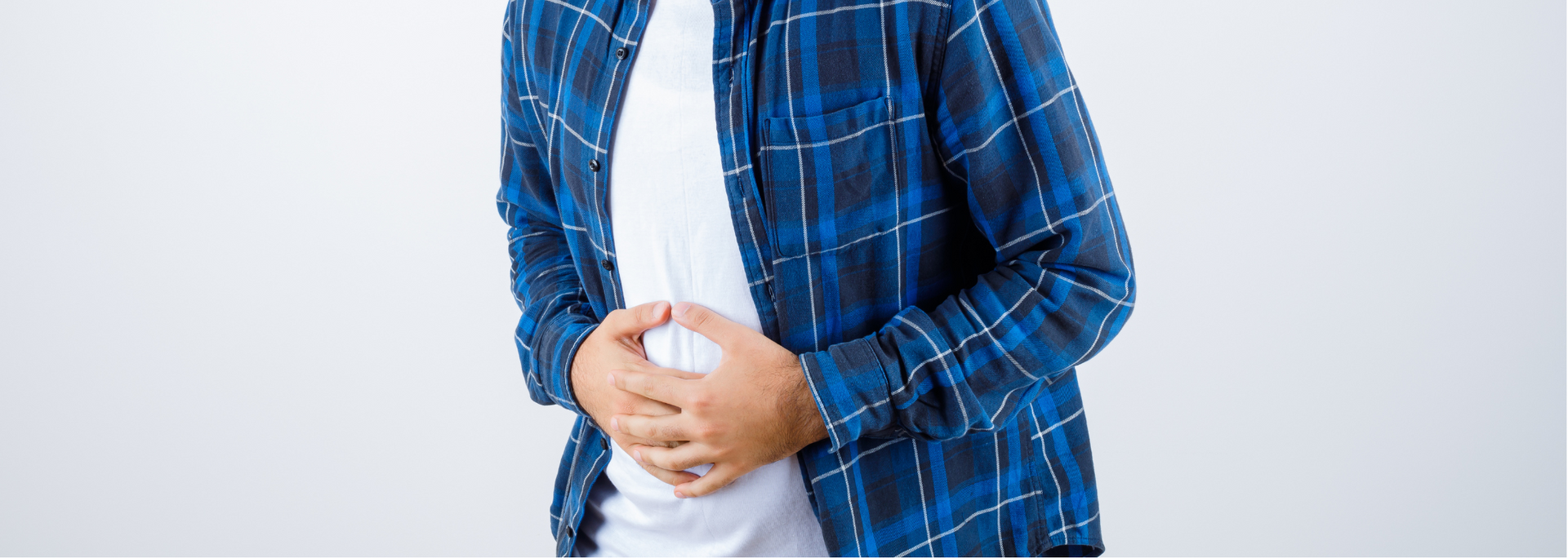 Picture of someone experiencing light stomach pain. Picture of someone experiencing light stomach pain.