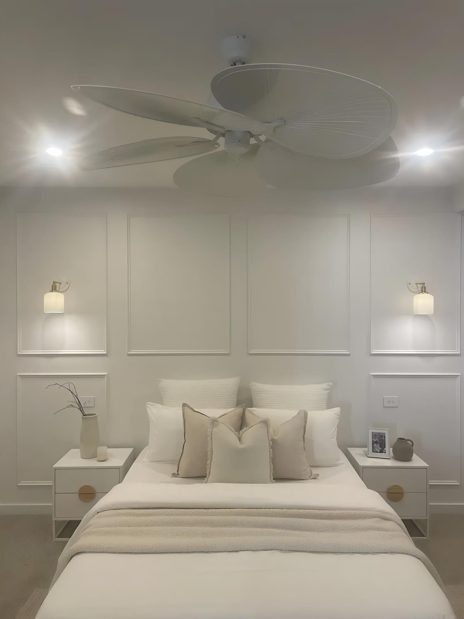 White Bedroom With a Bed, Nightstands, Wall Sconces, and a Ceiling Fan — Switched On Electrics in Wagga Wagga, NSW