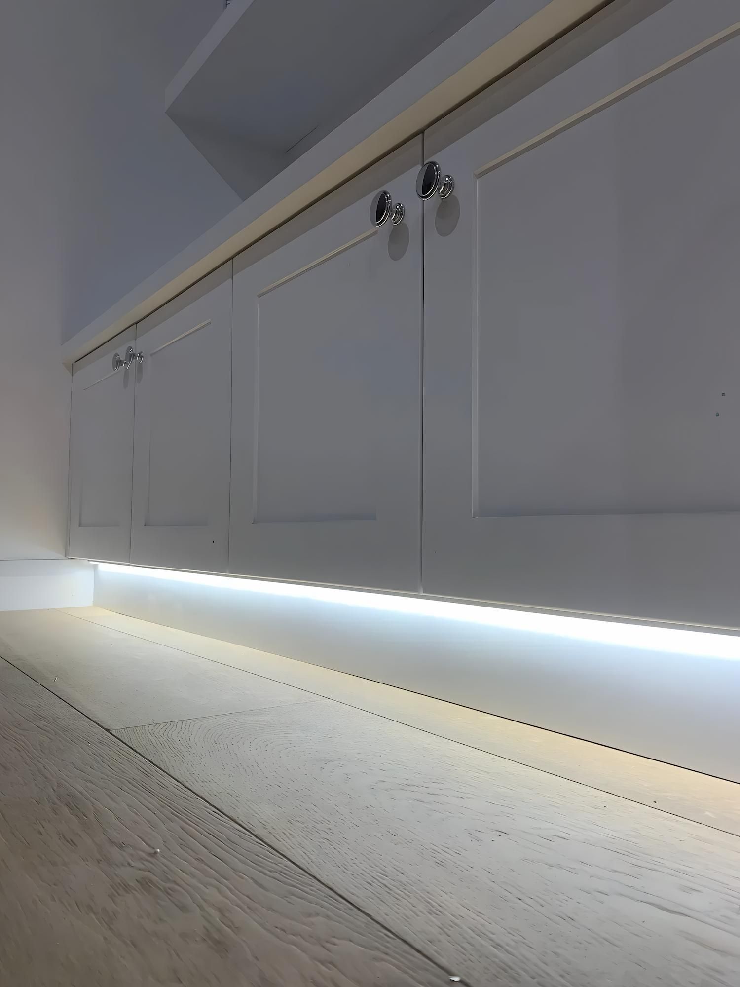 White Cabinets With Under-cabinet Led Lighting — Switched On Electrics in Wagga Wagga, NSW
