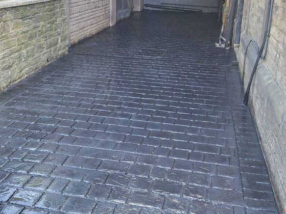 light grey imprinted concrete driveway in Sheffield
