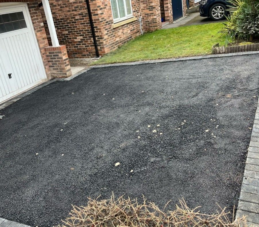 Driveways Sheffield before resurfacing a black tarmac Driveway