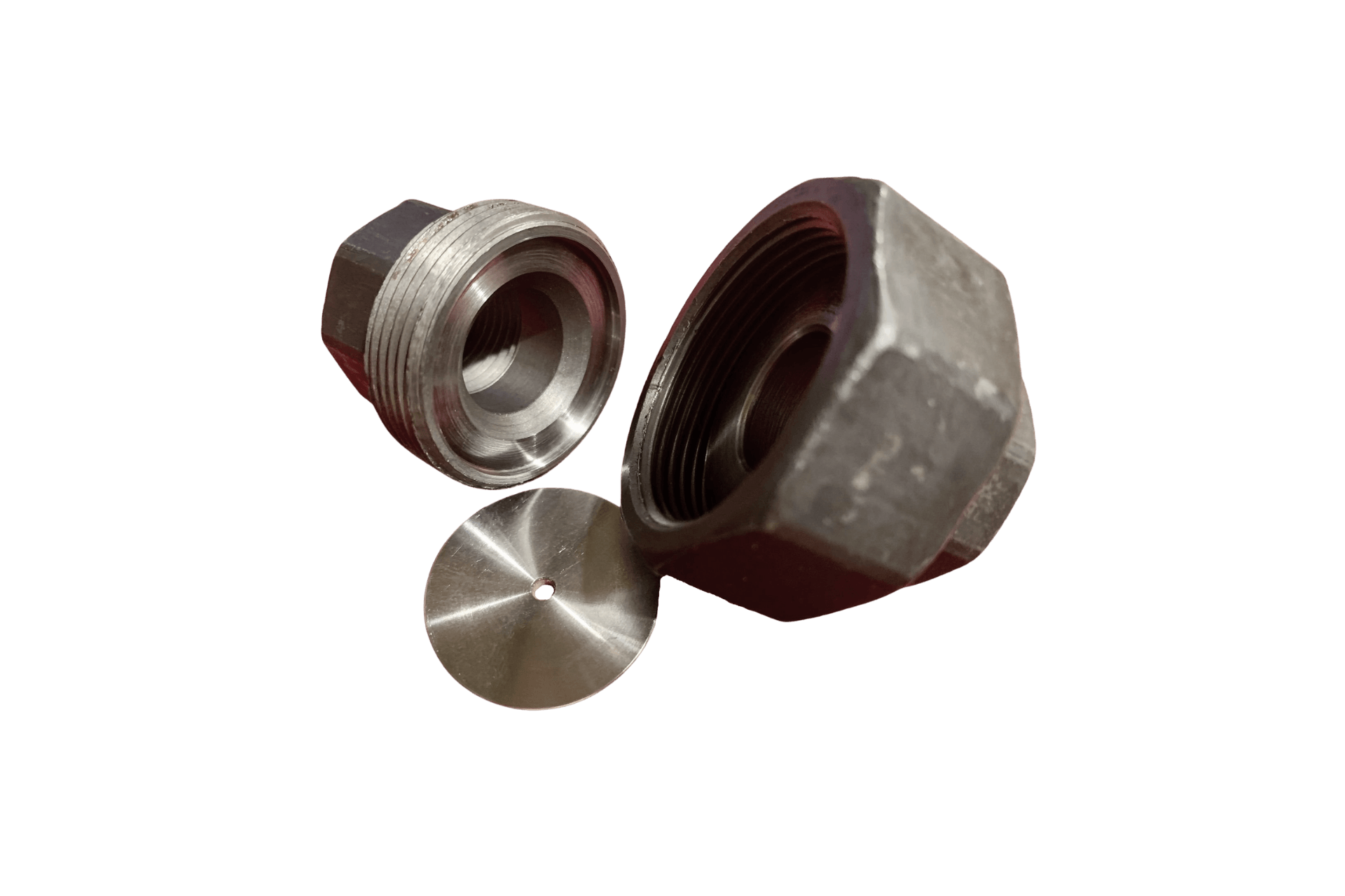 Three metal parts: a nut, a threaded fitting, and a small disc with a hole.