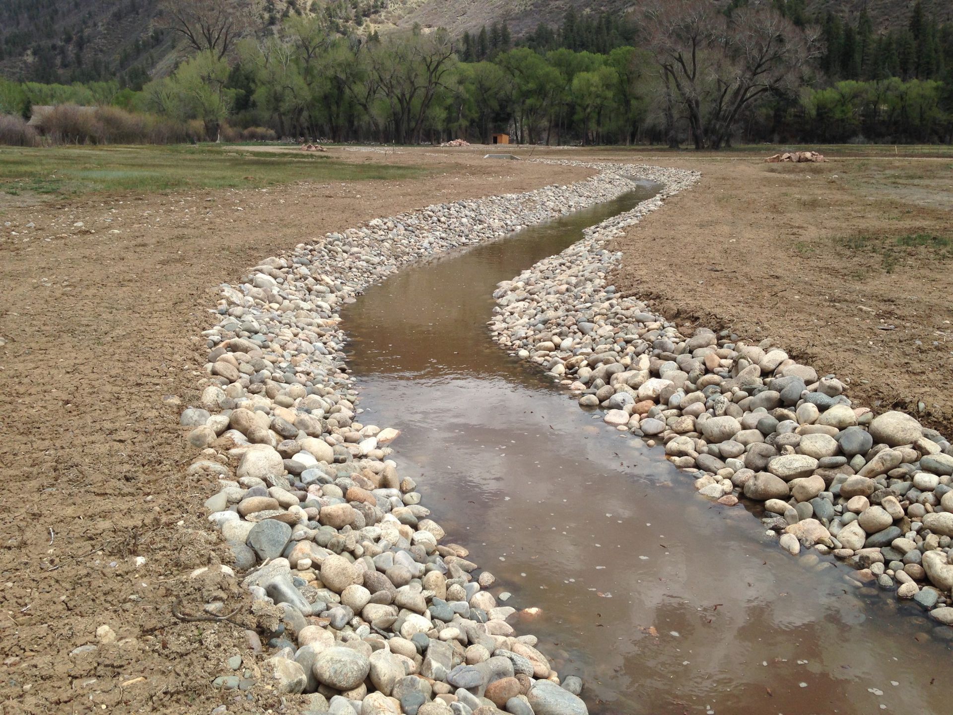 Sunnyside Gravel and Excavation, contractors in Durango CO La Plata county grading and rock work, irrigation, stream bed, pond