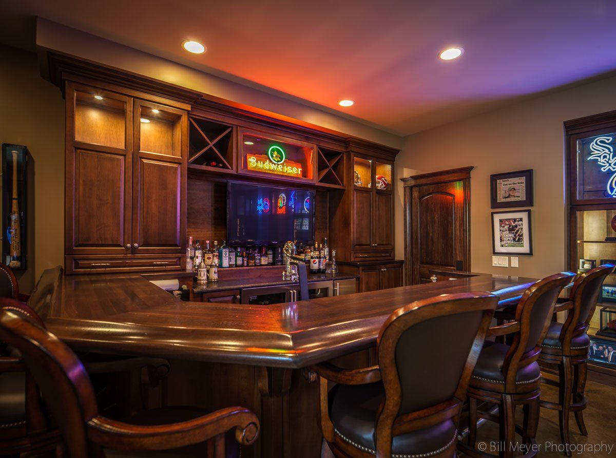 There is a bar in the middle of the room.