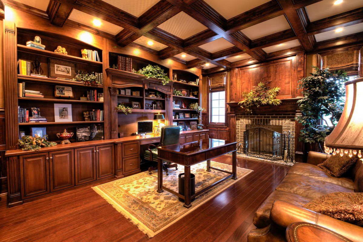 A living room with hardwood floors and a fireplace