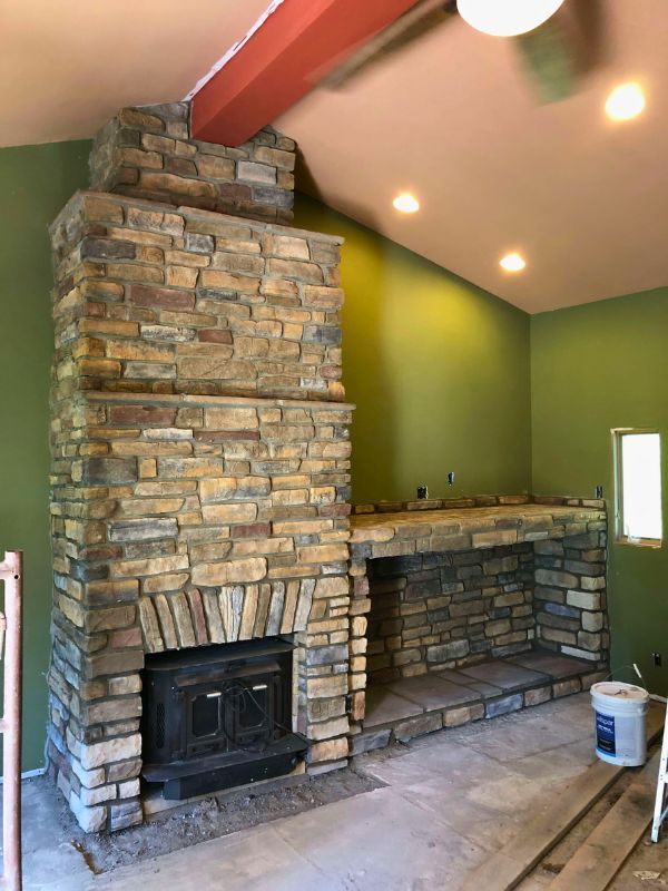 Fireplace repair and restoration completed by professional contractors.