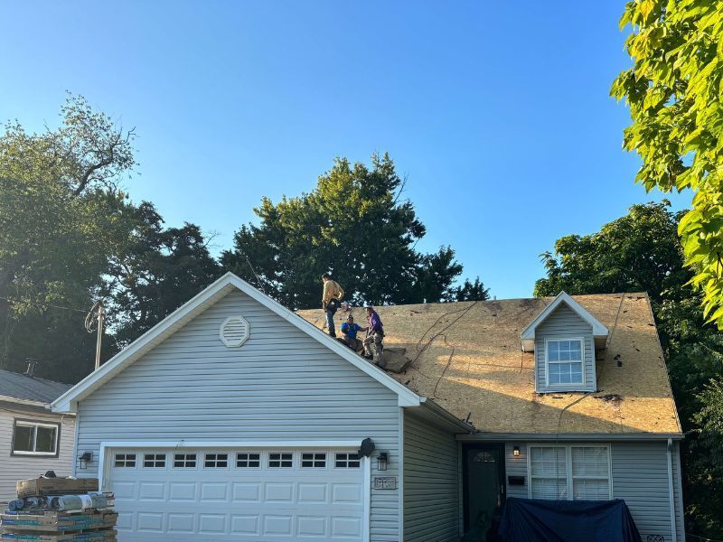 Storm damage roof repair performed by local roofing experts.