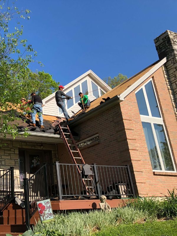 Storm-damaged roof replacement by Eli’s Roofing
