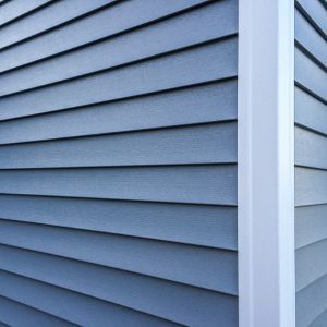 Vinyl siding installation by Eli’s Roofing
