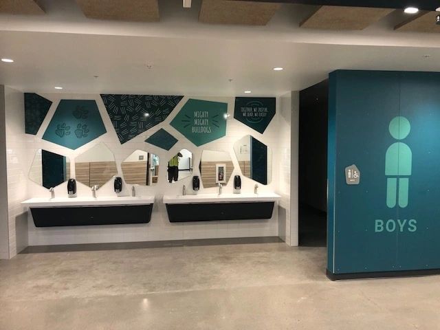 A brick building with a sign that says fox run