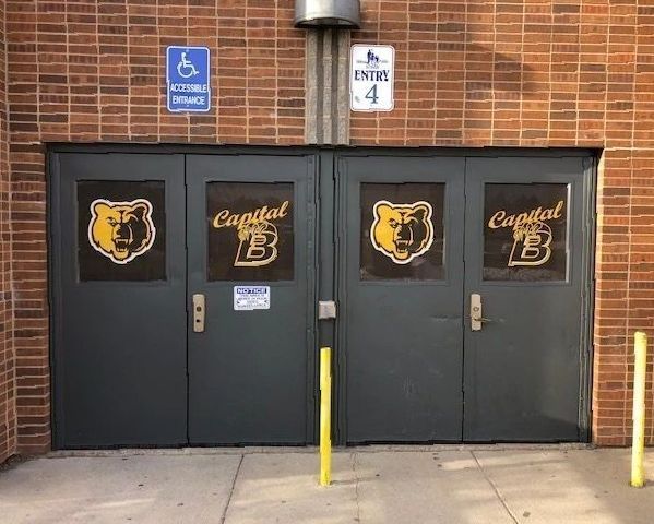 A blue sign for homewood suites by hilton