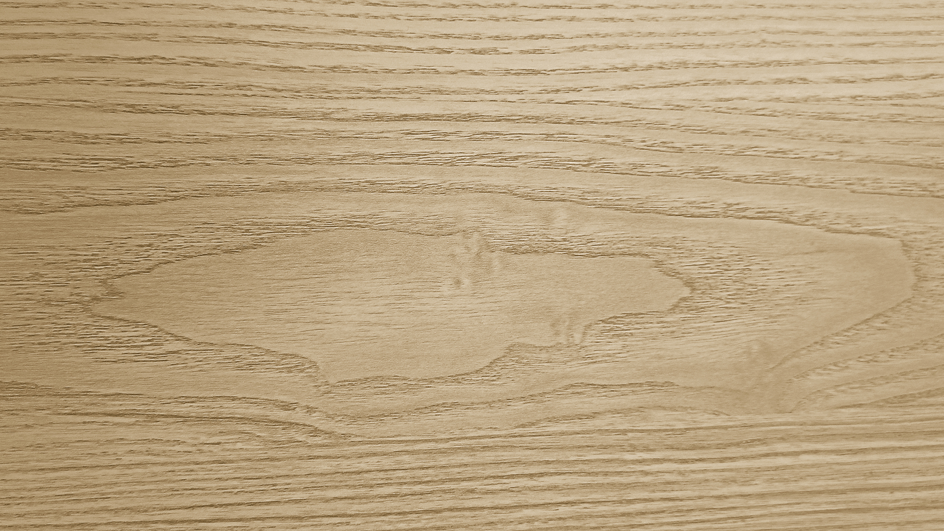 Tan wood grain pattern with a knot.