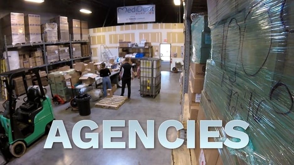 A warehouse with the word agencies written on the wall