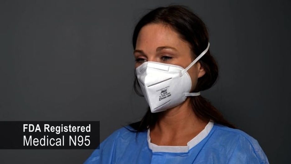 A woman wearing an FDA-registered medical n95 mask