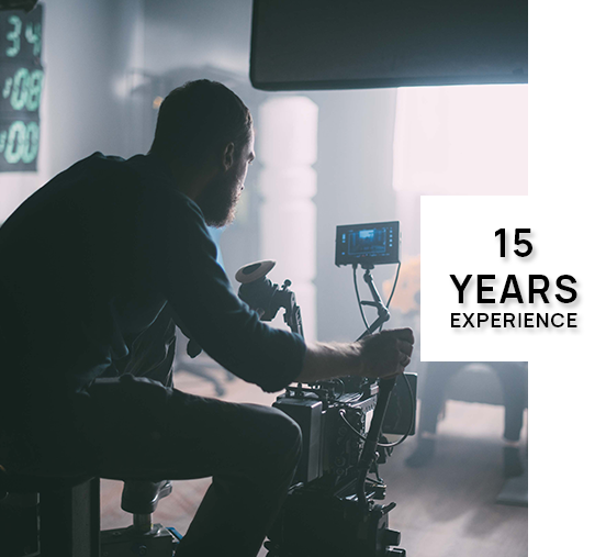 A man is sitting in front of a camera with the words 15 years experience below him