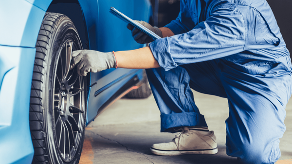 mechanic doing a pre-purchase inspection