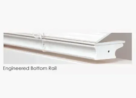 White, engineered bottom rail from a window blind, shown in close-up.