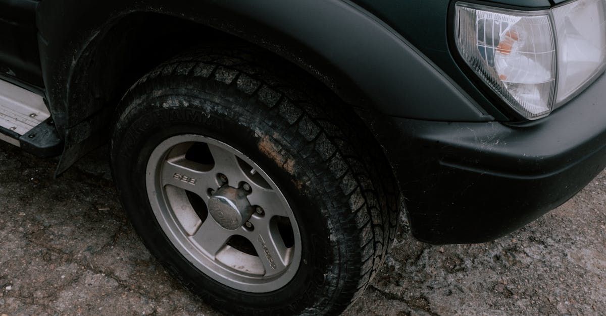 A close up of a car tire on a dirt road. | That's My Mechanic