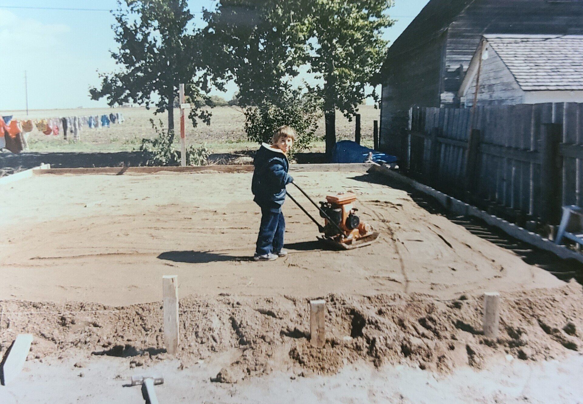 Packing sand for a garage pad