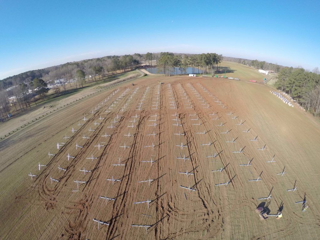 An aerial view of a field with a lot of crosses in it.