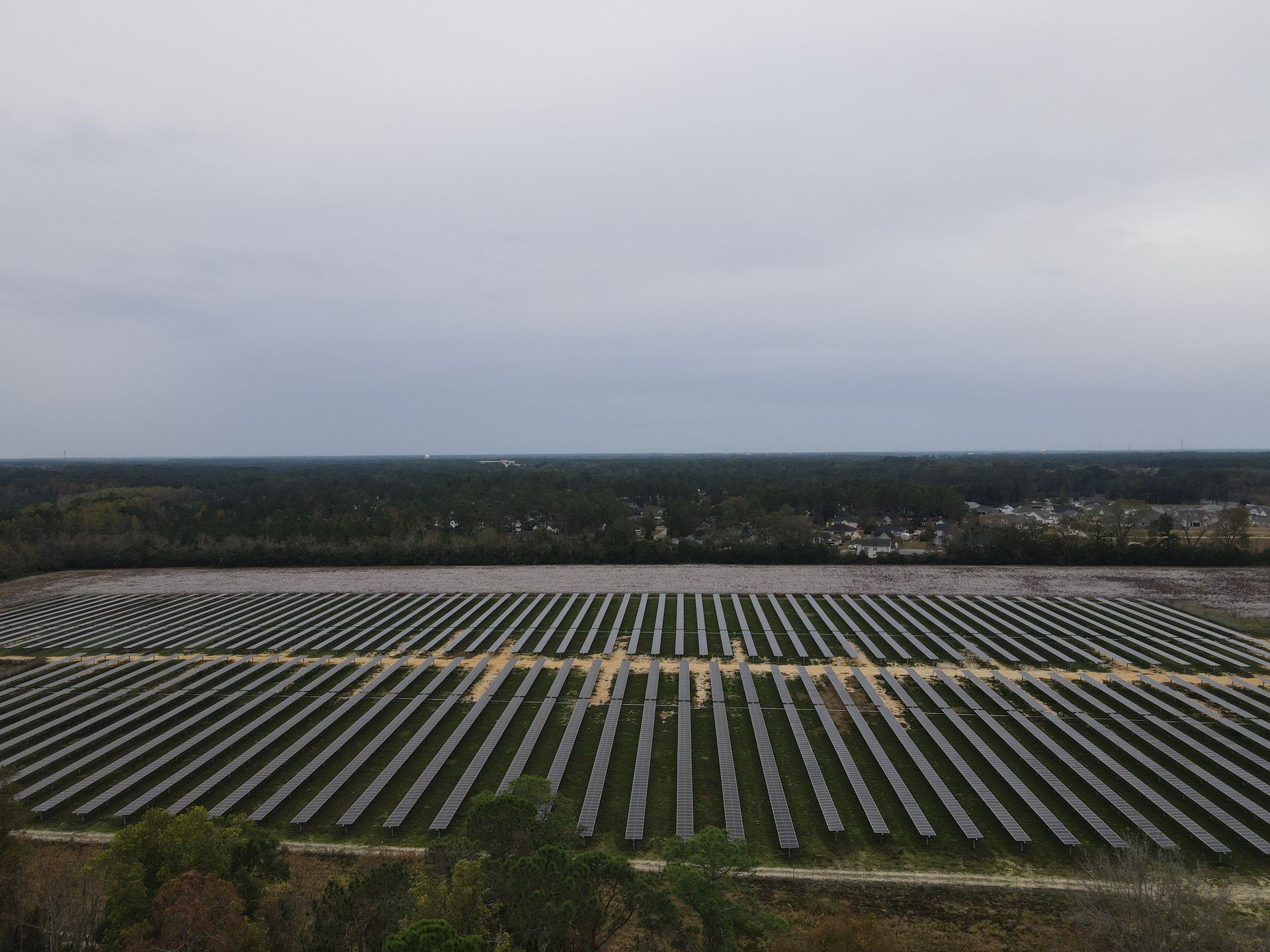 An aerial view of a large field of an ATI solar panel system