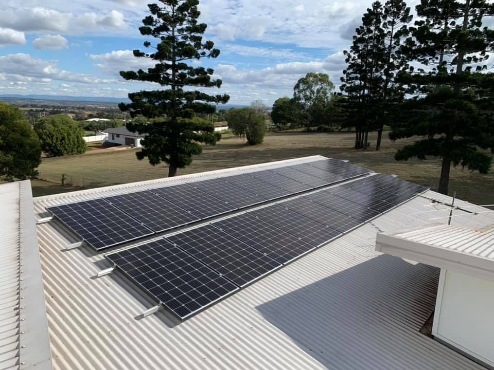 There Are Many Solar Panels On The Roof Of A House — Evolution Solar Kingaroy in Kingaroy, QLD