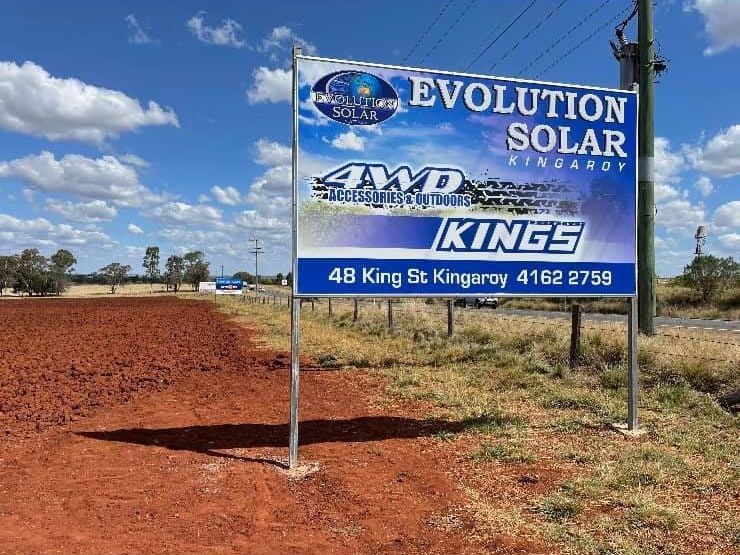 A Billboard For Evolution Solar Kings Is Sitting In The Middle Of A Dirt Field — Evolution Solar Kingaroy in Kingaroy, QLD