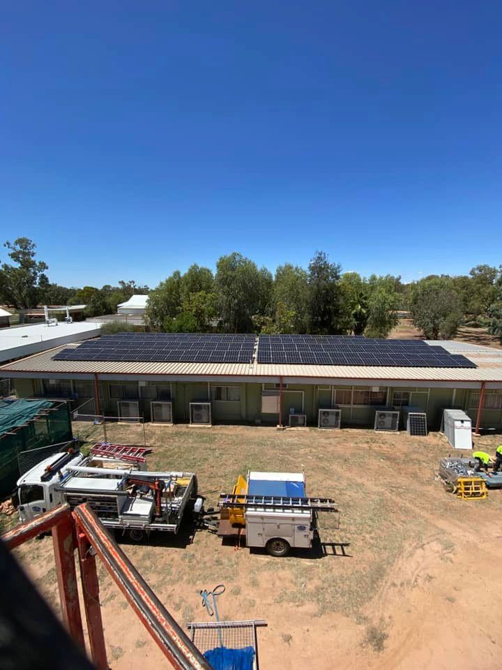 A Large Building With A Lot Of Solar Panels On The Roof — Evolution Solar Kingaroy in Kingaroy, QLD
