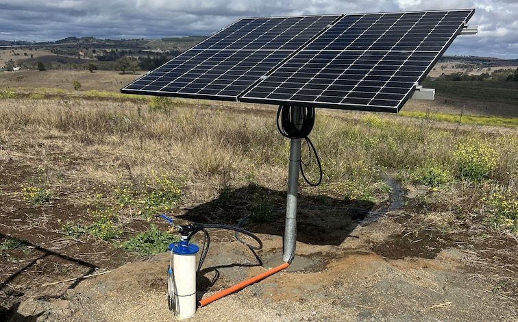 A Solar Panel Is Sitting on Top of A Dirt Field — Evolution Solar Kingaroy in Kingaroy, QLD