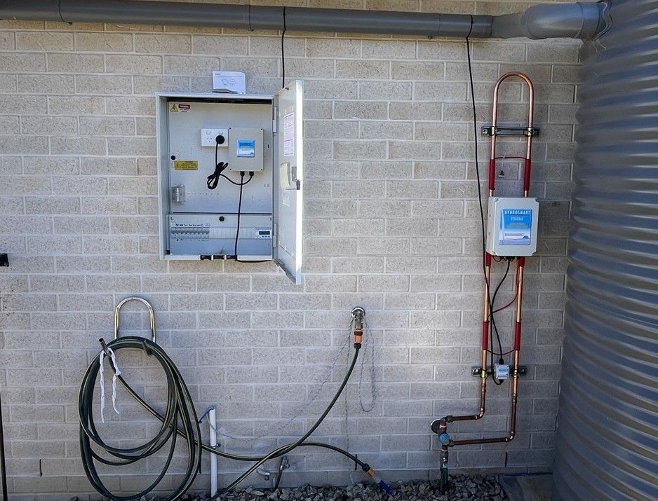 A Brick Wall with A Hose Attached to It — Evolution Solar Kingaroy in Kingaroy, QLD