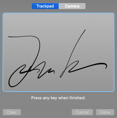 A picture of a signature that says john on it
