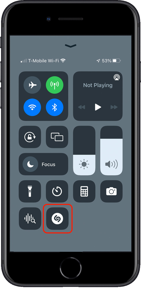 A cell phone with a remote control on the screen.
