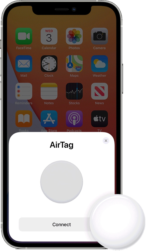 A cell phone with a white airtag on it.