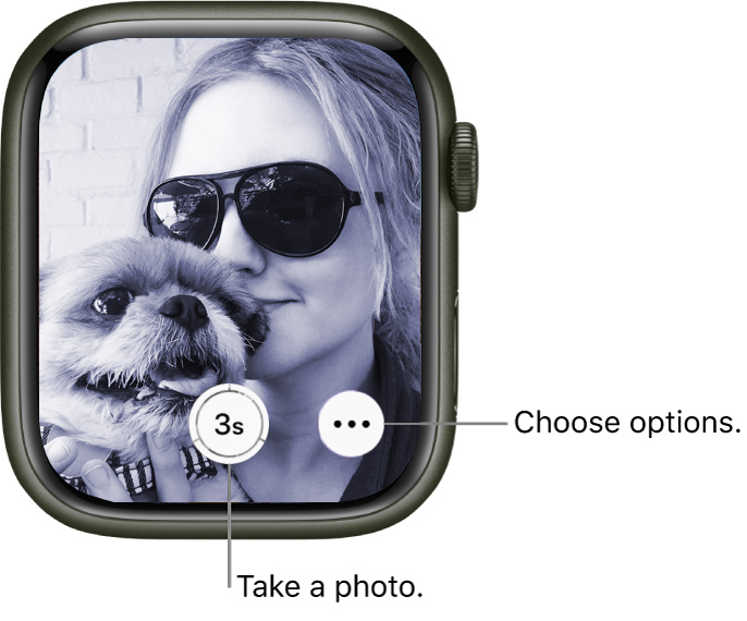 A woman is taking a picture of herself and her dog.