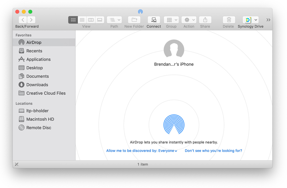 A computer screen shows a circle with a picture of a phone in it.