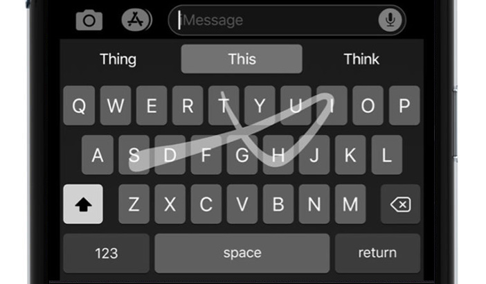A cell phone with a keyboard and a message on the screen
