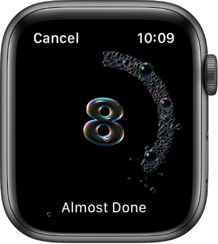 A close up of an apple watch showing the time as 10:09 and almost done.
