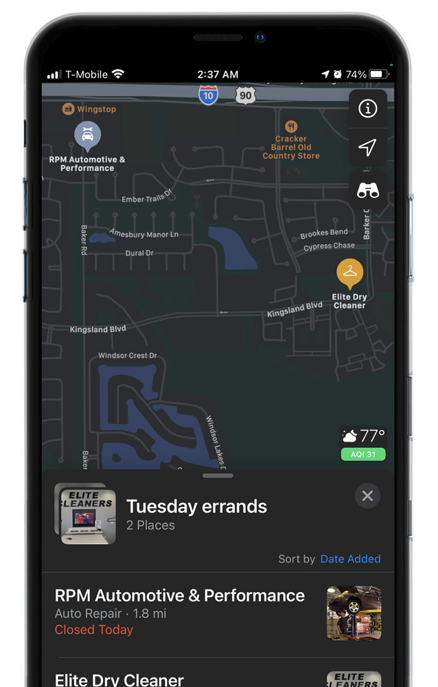 A cell phone with a map on the screen.