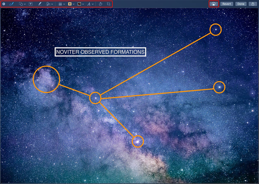 A computer screen shows a picture of the milky way galaxy