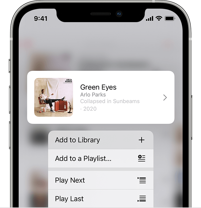 A phone screen shows a song called green eyes by arlo parks