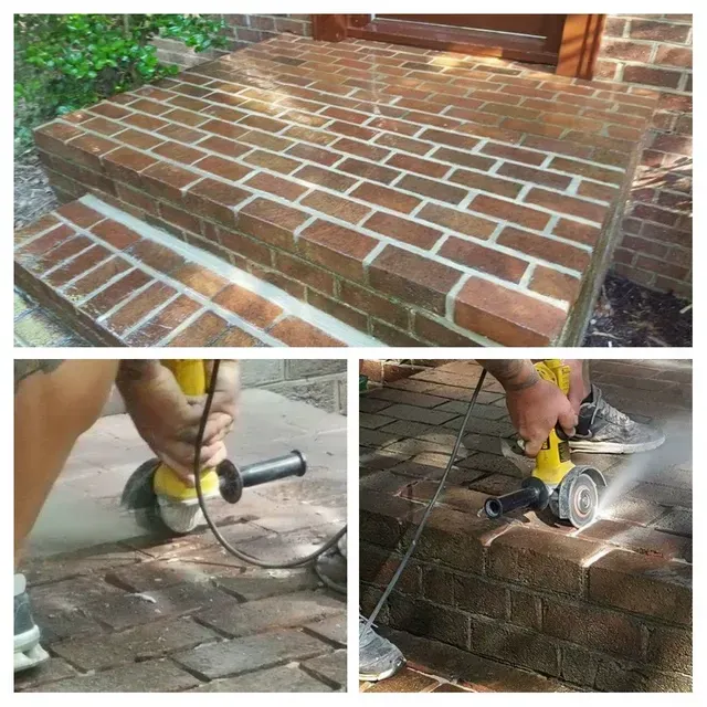 Brick steps being cleaned with an angle grinder, creating dust and sparks.